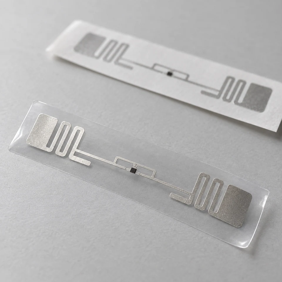 Illustrative RFID inlays showing antenna patterns and chip attachment areas.